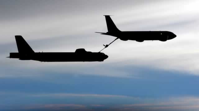 Boeing B-52 in-air refueling by a KC-135 Stratotanker  Boeing B-52 in-air refueling by a KC-135 Stratotanker