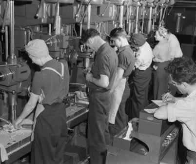 Workers at drill presses at the Ford Willow Run Plant Workers at drill presses at the Ford Willow Run Plant