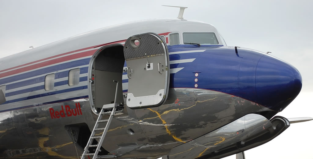 Douglas DC-6B "Red Bull", Registration N996DM, seen here in Pau, France