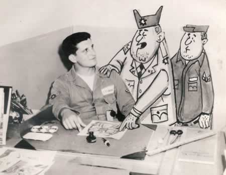 John Stinger, age 18, at his desk at the England AFB newspaper "The Tiger Talk" John Stinger, age 18, at his desk at the England AFB newspaper "The Tiger Talk"