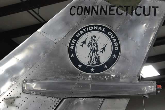 "Connecticut Air National Guard" markings on the tail of the restored F-100 Super Sabre at the New England Air Museum "Connecticut Air National Guard" markings on the tail of the restored F-100 Super Sabre at the New England Air Museum