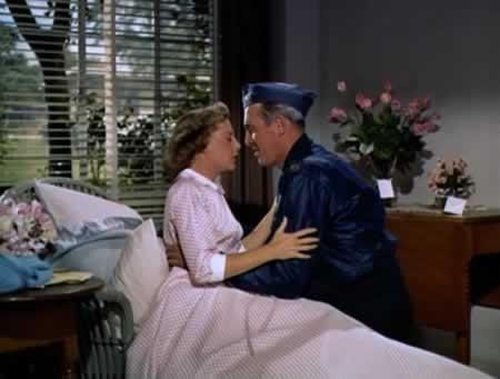 James Stewart, playing the role of Dutch, meets with June Allyson, in the role of his wife Sally, in the movie "Strategic Air Command" James Stewart, playing the role of Dutch, meets with June Allyson, in the role of his wife Sally, in the movie "Strategic Air Command"