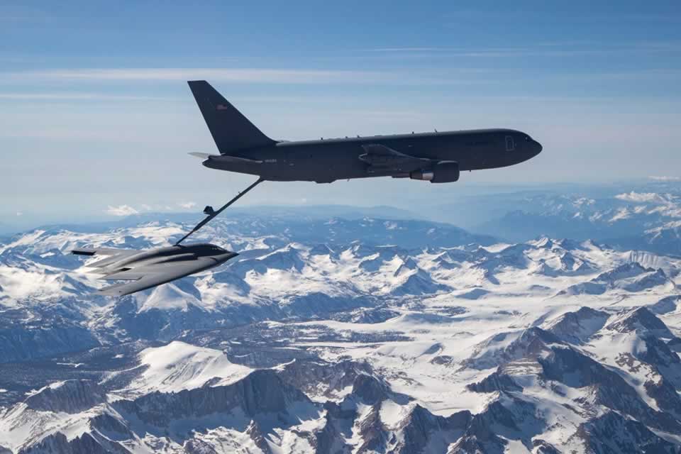 USAF KC-46A Pegasus tanker refueling a B-2 Spirit bomber USAF KC-46A Pegasus tanker refueling a B-2 Spirit bomber