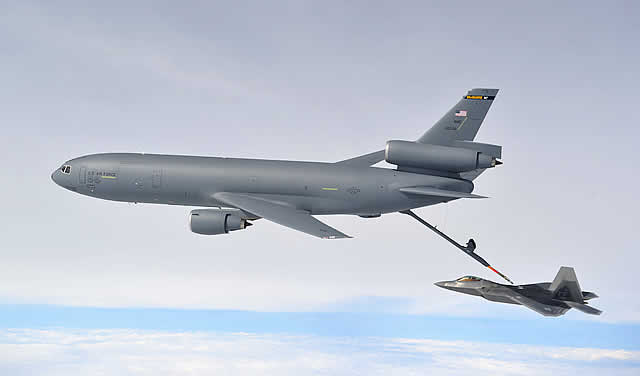 KC-10 Extender of the United States Air Force during in-flight refueling operations with a F-22 Raptor KC-10 Extender of the United States Air Force during in-flight refueling operations with a F-22 Raptor