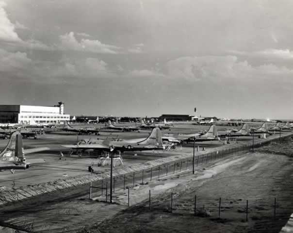 Boeing Wichita Plant, exterior view, with completed B-29s parked on tarmac Boeing Wichita Plant, exterior view, with completed B-29s parked on tarmac